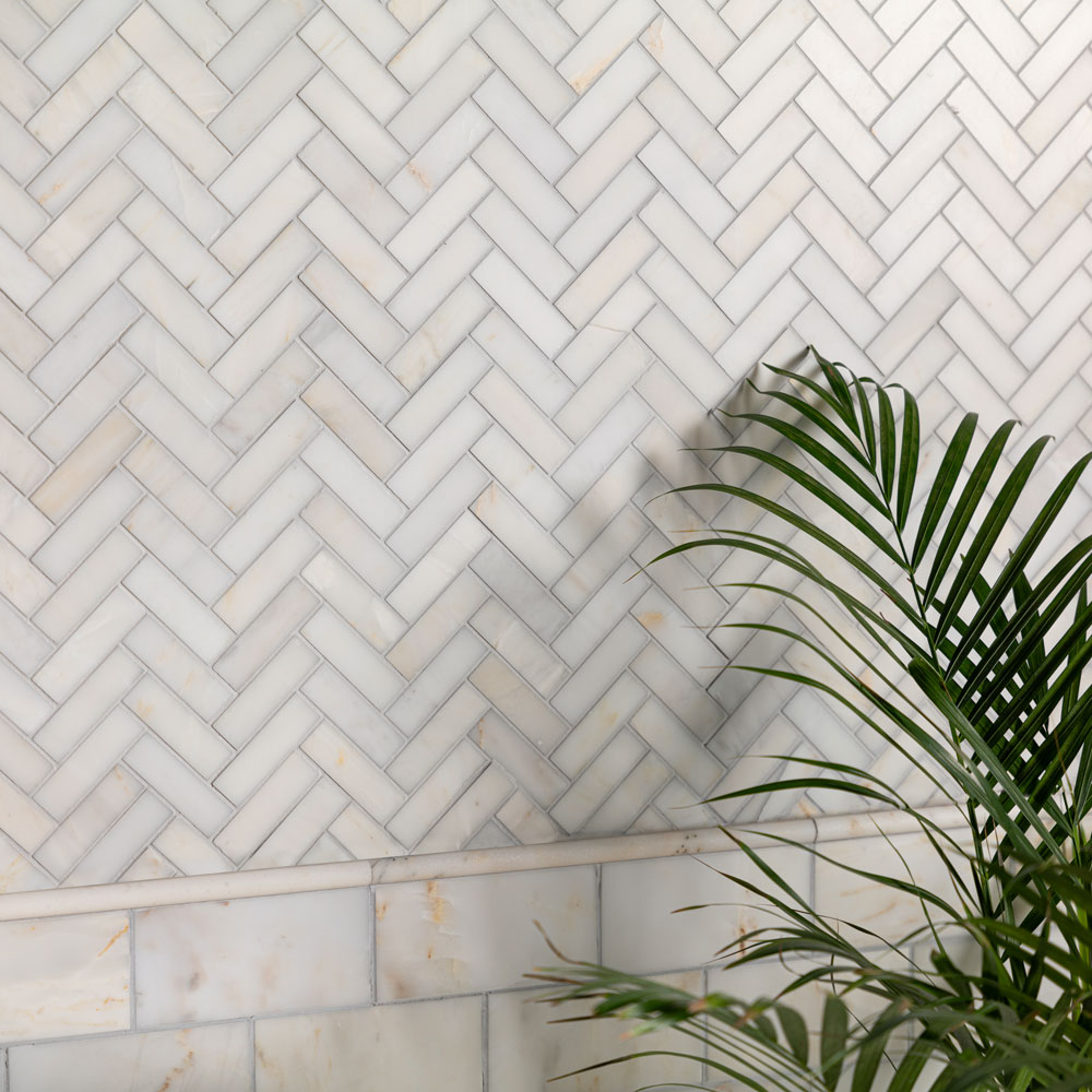 Calacatta-Amber-Marble-Herringbone-Mosaic-Tiles