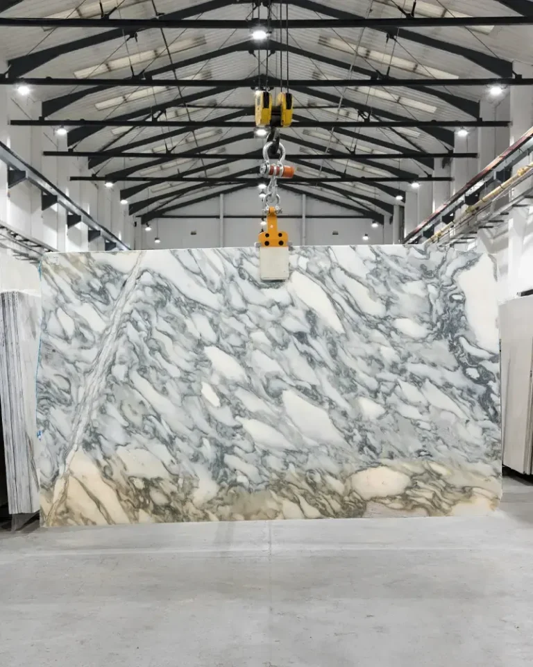 Arabescato Apuano honed marble slab with light background and distinctive grey natural veining
